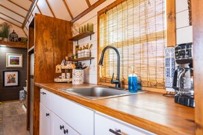 Fridge, microwave, stovetop, coffee/tea maker