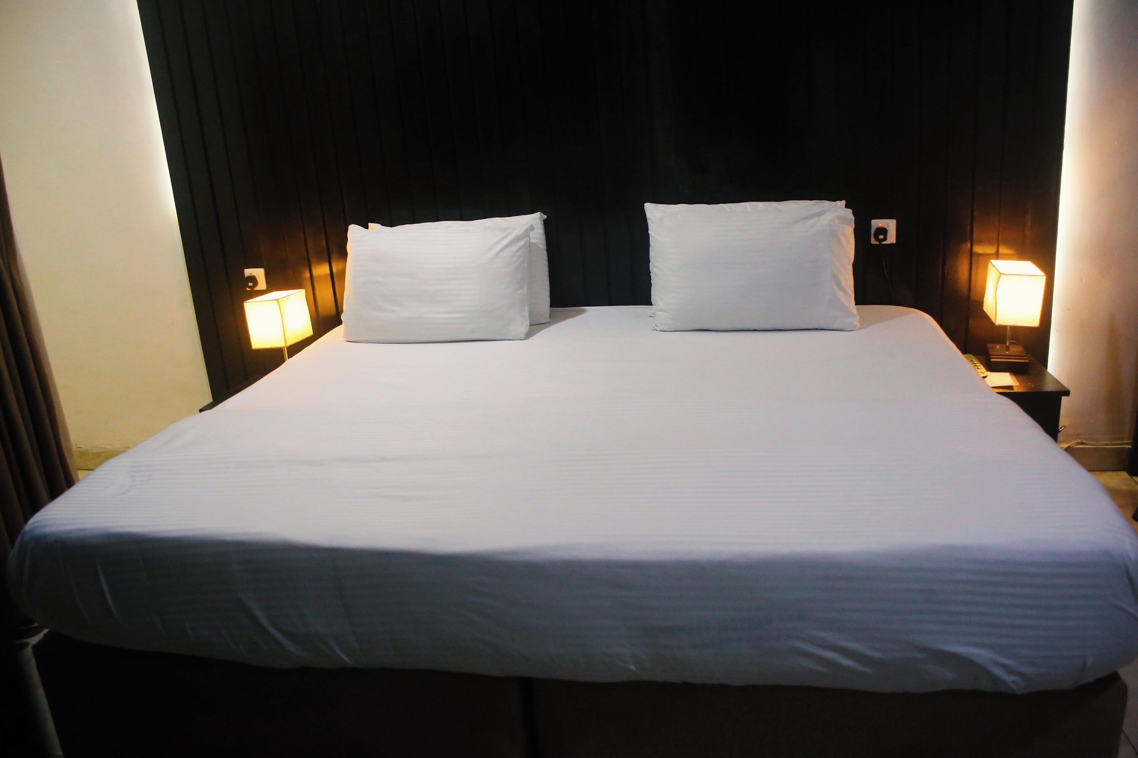 Premium bedding, pillow-top beds, desk, laptop workspace