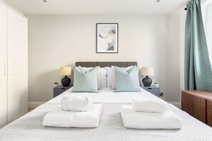 2 dormitorios, tabla de planchar con plancha, wifi gratis y ropa de cama