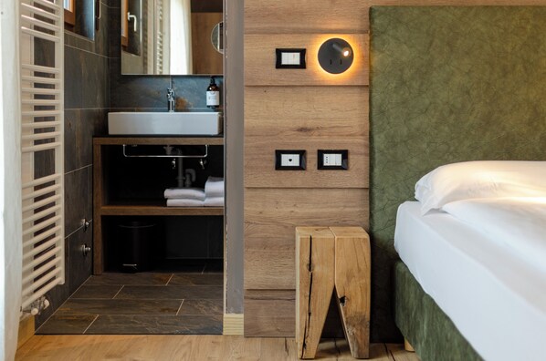 Premium bedding, down duvets, pillow-top beds, in-room safe