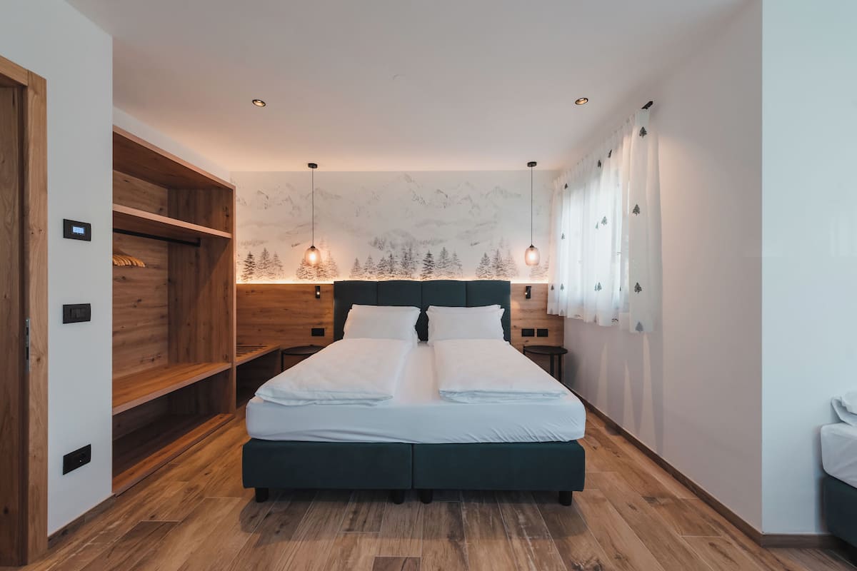 Phòng Suite dành cho gia đình, ban công | Bộ đồ giường cao cấp, chăn bông, nệm có lớp đệm bông 