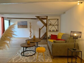 Chambre Premium | Coin séjour