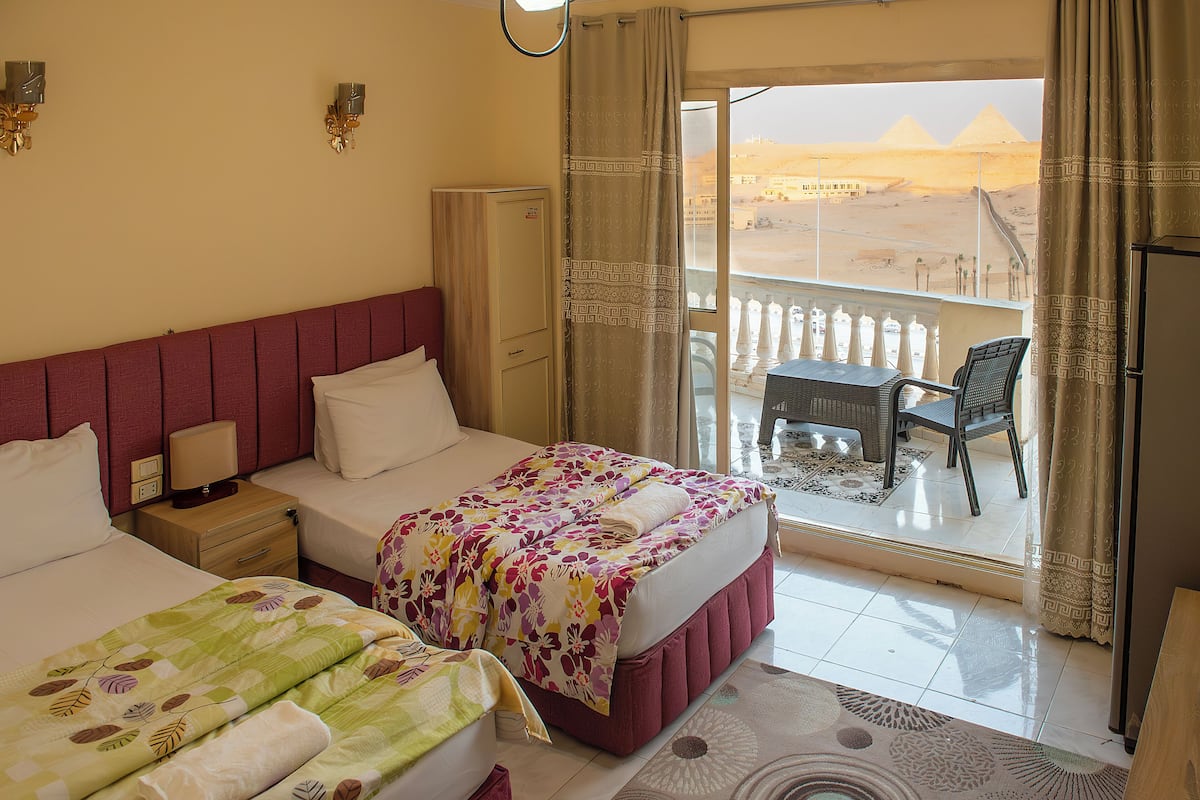 Twin Room, Pyramid view with Balcony | Hypo-allergenic bedding available, desk, laptop workspace, WiFi (free)