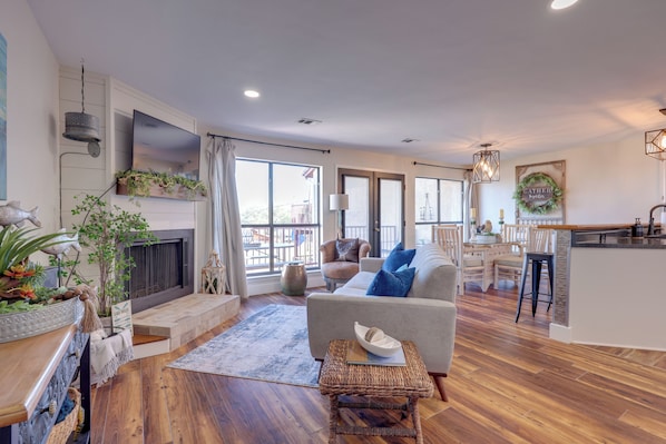 TV, fireplace, books