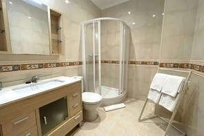 Hair dryer, towels, soap, toilet paper