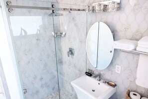 Shower, hair dryer, towels, soap - Dolphin Suites Unit 4 (Cruz Bay)