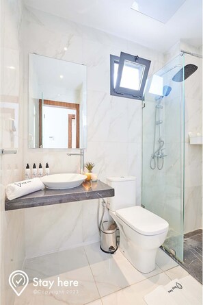 Shower, towels, soap, shampoo