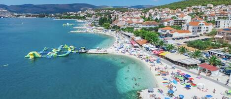 On the beach, sun loungers