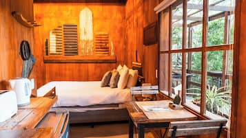 Cabana de disseny, 1 llit de matrimoni, amb bany privat, vistes al jardí | Sala d'estar