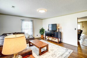 TV, fireplace, books