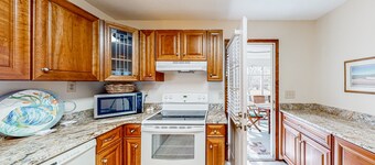 Comfortable home near beach with enclosed porch, washer/dryer, & central AC