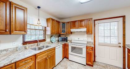 Comfortable home near beach with enclosed porch, washer/dryer, & central AC