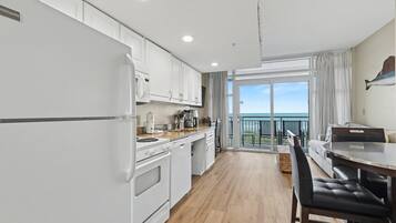 Coffee/tea maker, fridge, microwave, oven