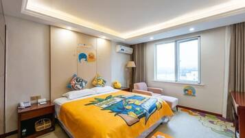 A hotel room with a bed, bedside table, lamp, chair, and a window with curtains.