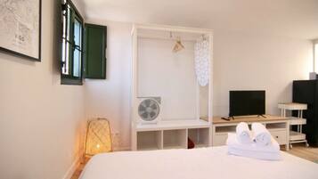 City Studio | Living area | 40-cm Smart TV with cable channels