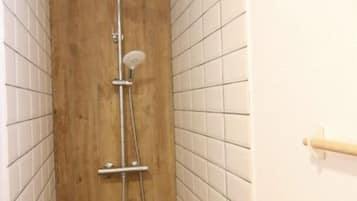 City Studio | Bathroom | Shower, towels, soap, shampoo