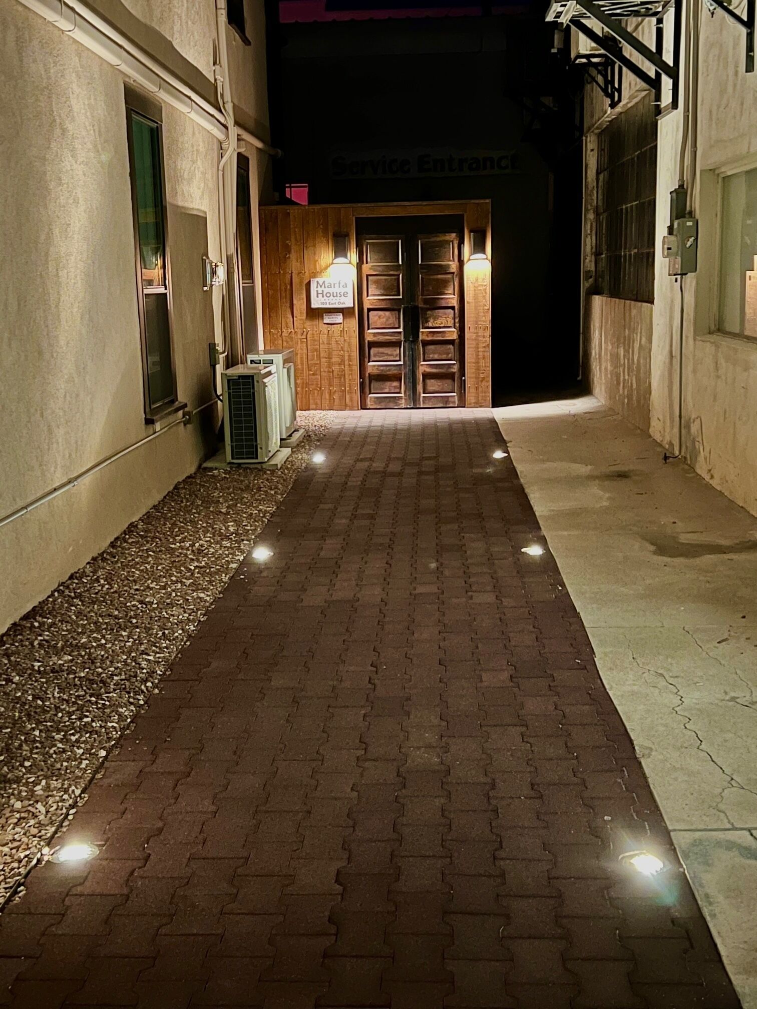 Lighted entry walkway at Marfa House