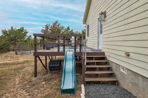 Try our different style of going down. Slide your worries away. - Family friendly | Hot Tub, Karaoke & Fire Pit (Dripping Springs)