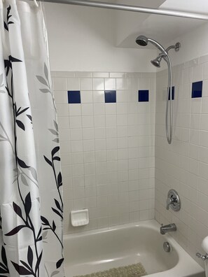 Hair dryer, towels, soap, shampoo