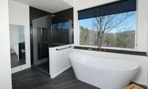 Bathtub, towels - Celestial View - Stunning mountain views and bright, modern interiors await! (Gatlinburg)