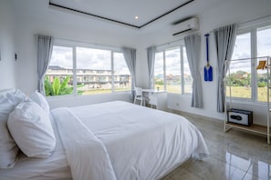 Enjoy a comfortable stay in this well-appointed room with a large bed and a desk for work.