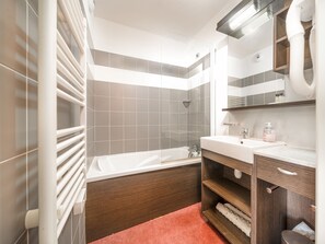 Bathtub, hair dryer