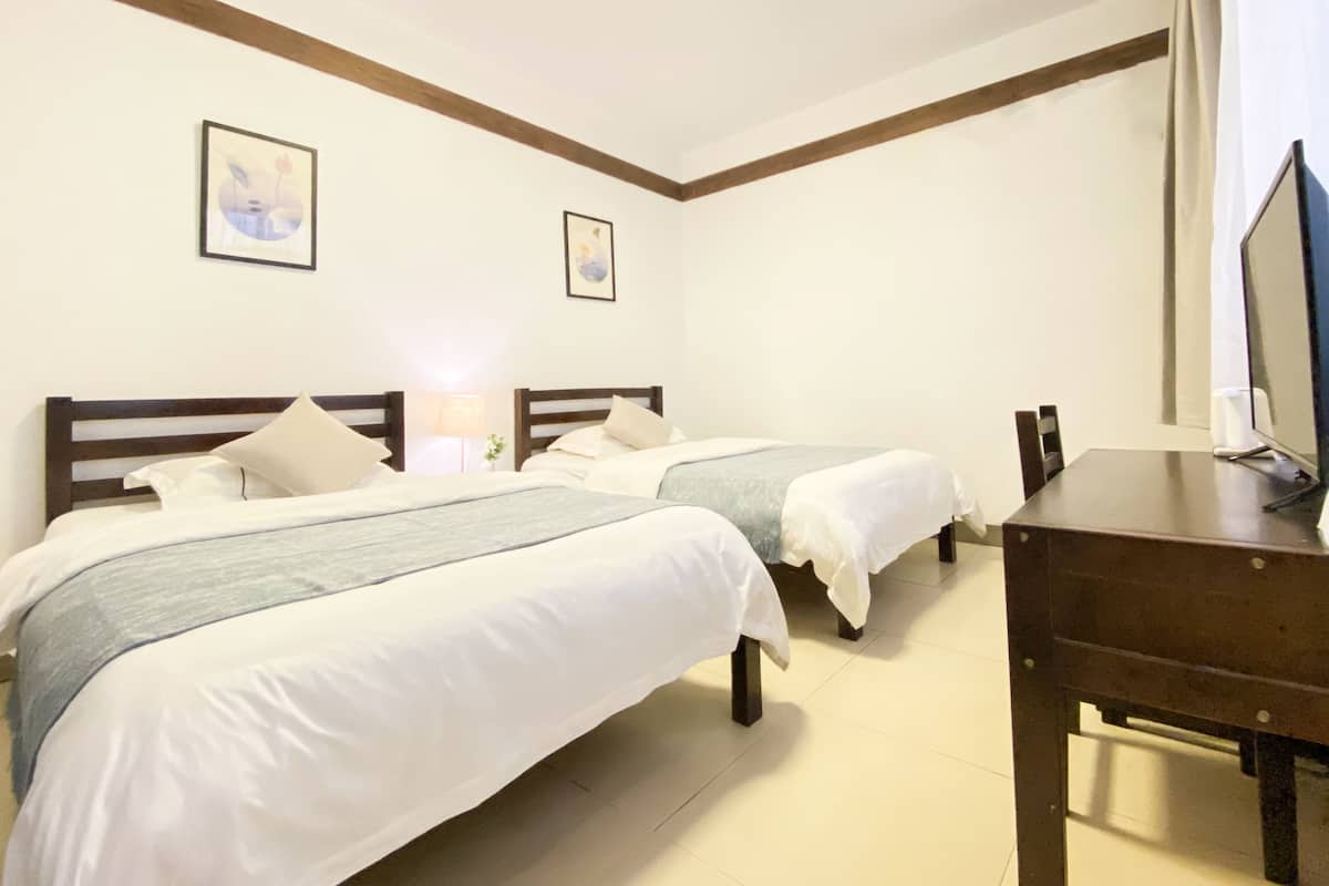Chambre Confort avec lits jumeaux