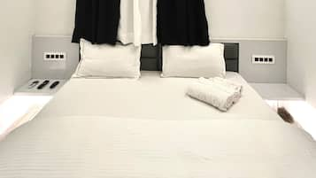 Premium bedding, down duvets, memory-foam beds, individually furnished