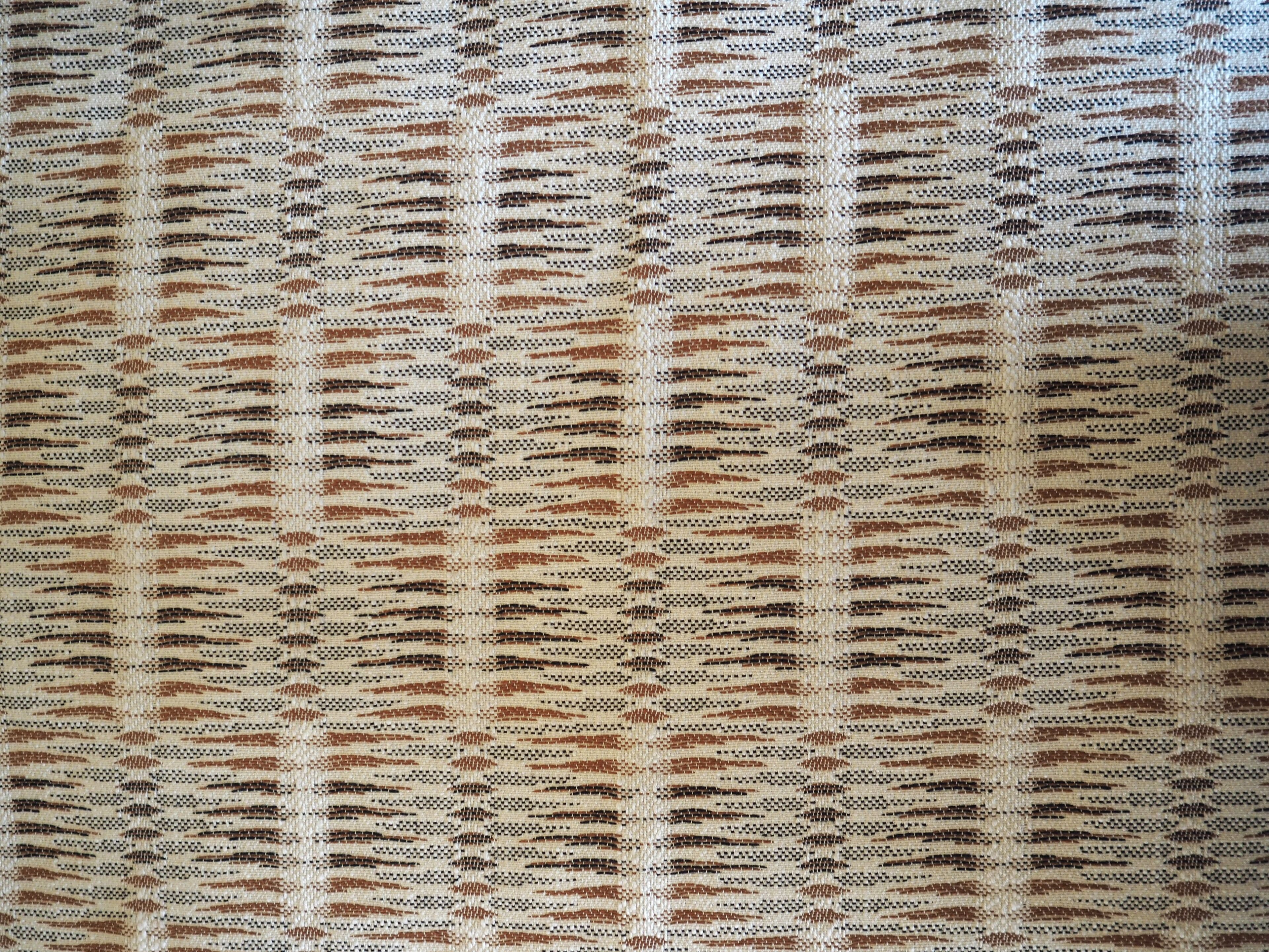 A patterned fabric with a repetitive design.