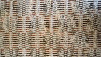 A patterned fabric with a repetitive design.