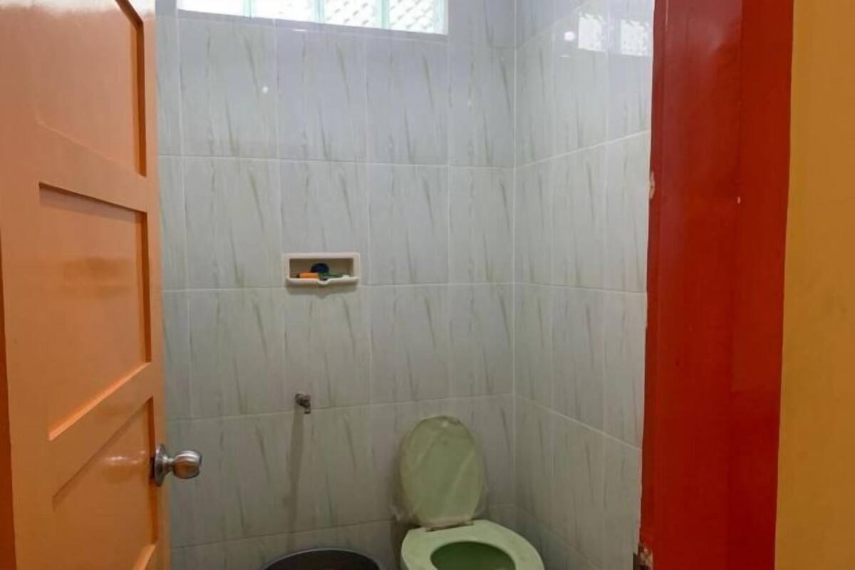 Baño | Regadera y toallas 
