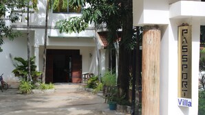 A villa entrance with a sign reading "PASSPORT Villa". - Passport Villa (Siem Reap)