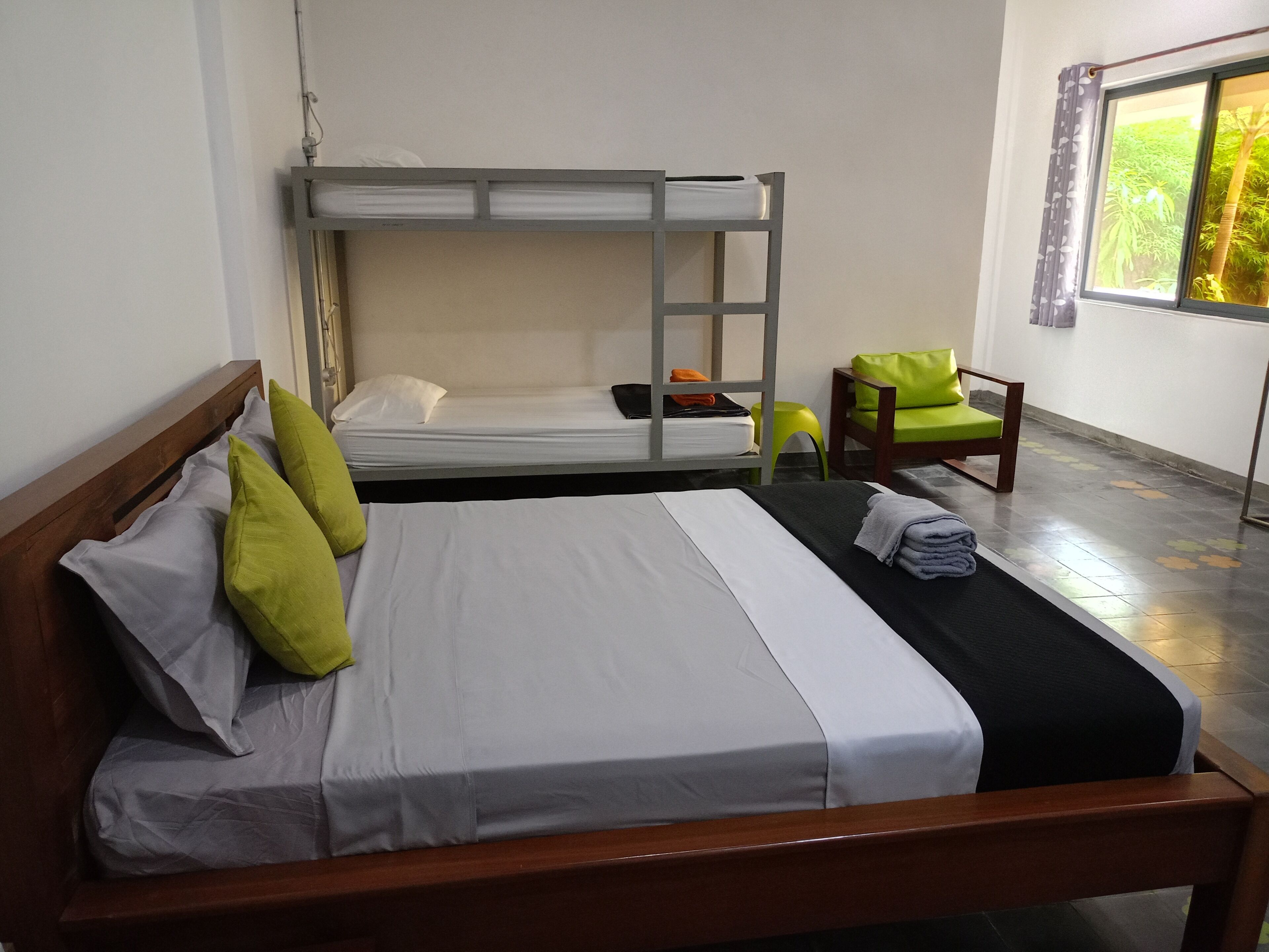 Family Room | Premium bedding, desk, laptop workspace, blackout drapes