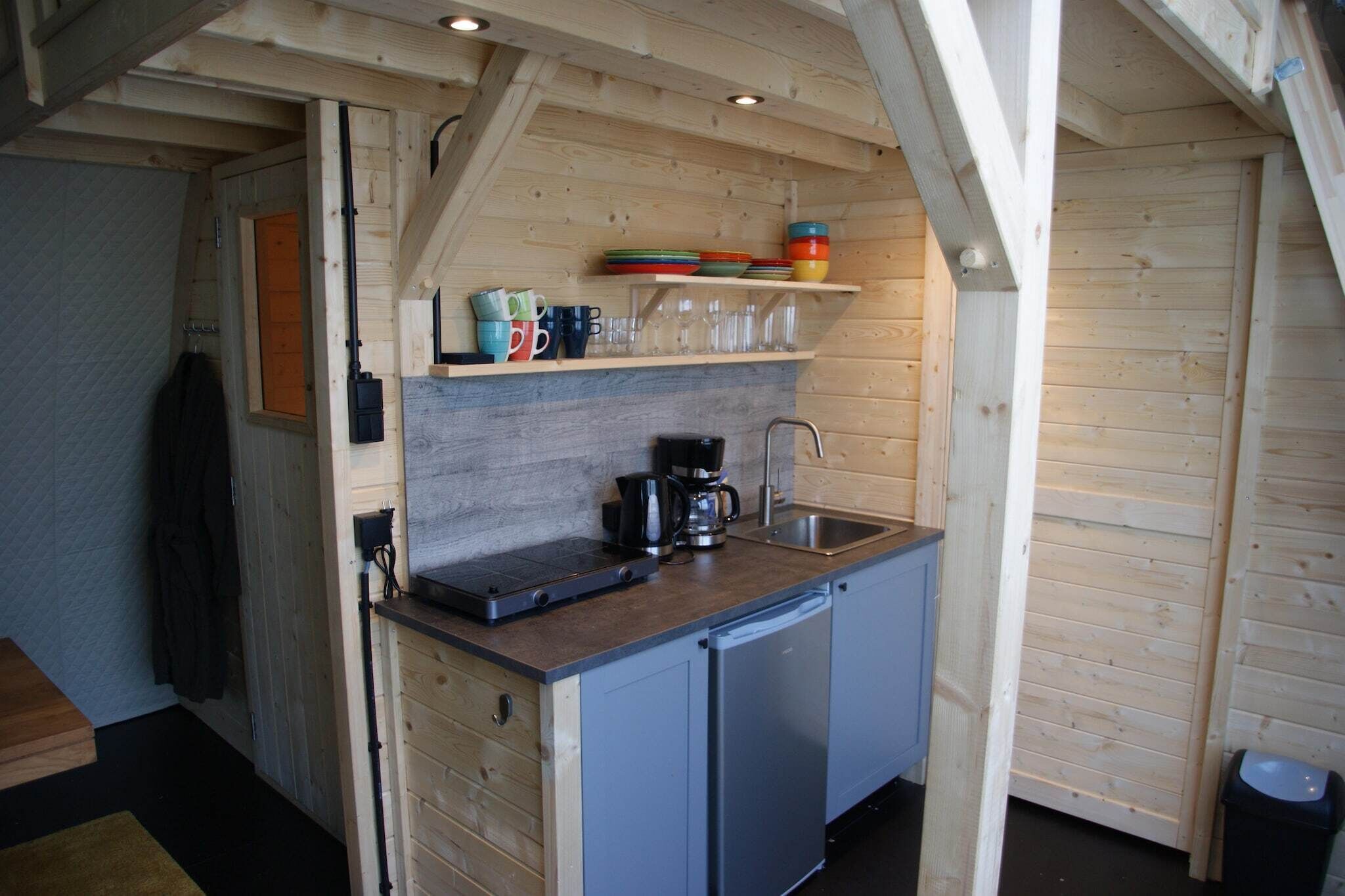 Fridge, stovetop, freezer, dining tables