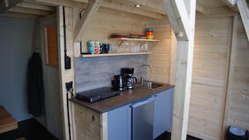 Fridge, stovetop, freezer, dining tables