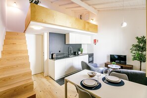 Loft exclusivo | Cocina privada | Frigobar, horno, parrilla de estufa y cafetera de espresso