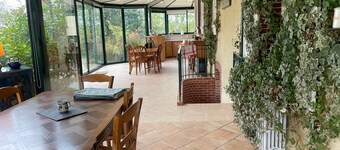 Charming Country Retreat with Fireplace, Veranda, and Nearby Lake Chalet