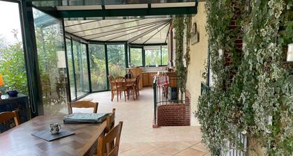 Charming Country Retreat with Fireplace, Veranda, and Nearby Lake Chalet