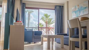 Studio, Balcony, Sea View | Living area | 43-inch Smart TV with satellite channels, TV