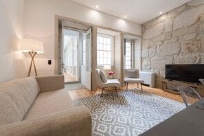 Apartamento Deluxe | Zona de estar