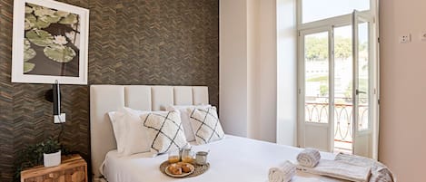 Departamento Deluxe | 1 habitación, tabla de planchar con plancha, wifi gratis y ropa de cama