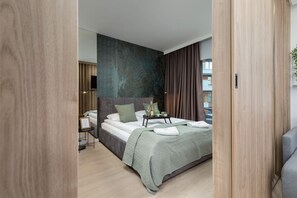 1 slaapkamer, een strijkplank/strijkijzer, wifi, beddengoed