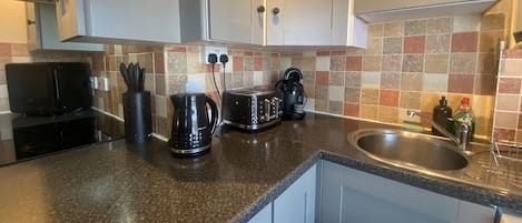 Fridge, microwave, oven, coffee/tea maker