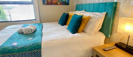 2 عدّة غرف نوم ومكواة/لوح كي وواي فاي مجانًا وملاءات أسرّة