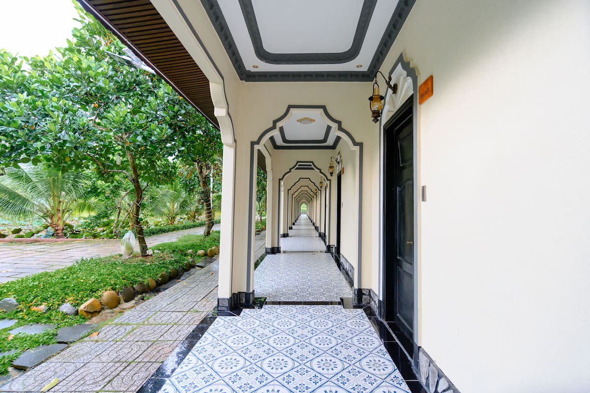 Deluxe Room, Garden View | Peralatan tempat tidur premium, meja, Wi-fi percuma, cadar katil