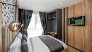 Habitación Deluxe doble | Ropa de cama de alta calidad, minibar, caja fuerte y escritorio