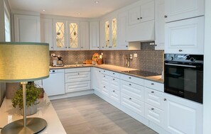 Fridge, microwave, dishwasher, coffee/tea maker