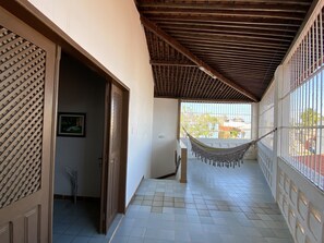 Relax in style with a hammock on the balcony, overlooking the surroundings.