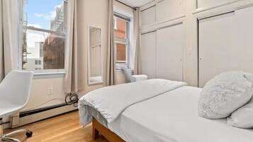 2 bedrooms, desk, iron/ironing board, travel crib