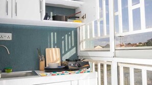 Mini-fridge, cookware/dishes/utensils